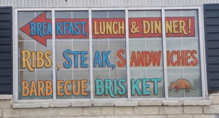 Signage painted on windows